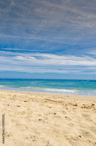 Spanish coast  sand and beautiful weather all year with clear blue sky. Romantic vacation and travel. Clean and neat beaches wonderful sea  marvelous nature paradise for holidaymakers in europe 