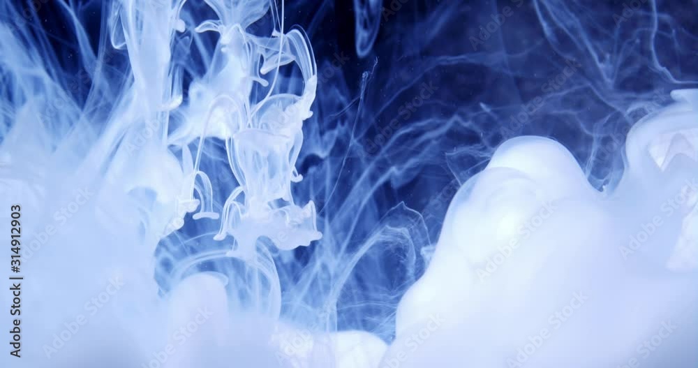 White Fluids and Particles in Motion under water. Macro. White Fluids and Particles in Motion under water. Macro.