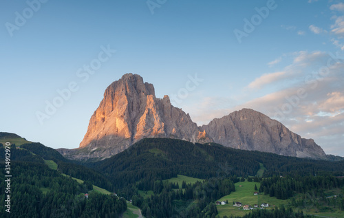 The north eastern side of Sasso Lungo at sunrise from the Val Gardena area photo