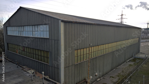 metal facade of the building. windows and roof