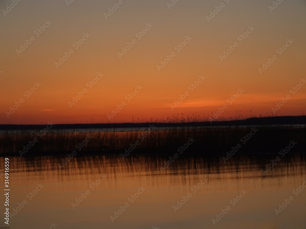 Colorful sunset over Karelian lake Colorful sunset over Karelian lake