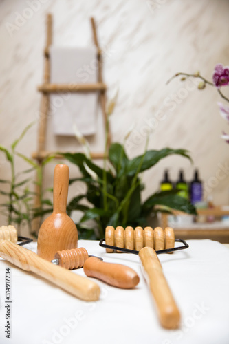Wooden equipment for anti-cellulite maderotherapy massage photo