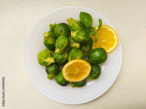 brussel sprout cooked with olive oil in the plate, top view