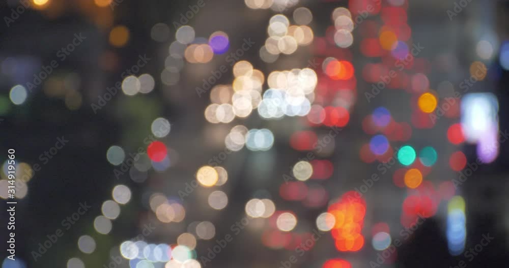 Out of focus car lights moving on a multiple lane highway in Seoul, South Korea.