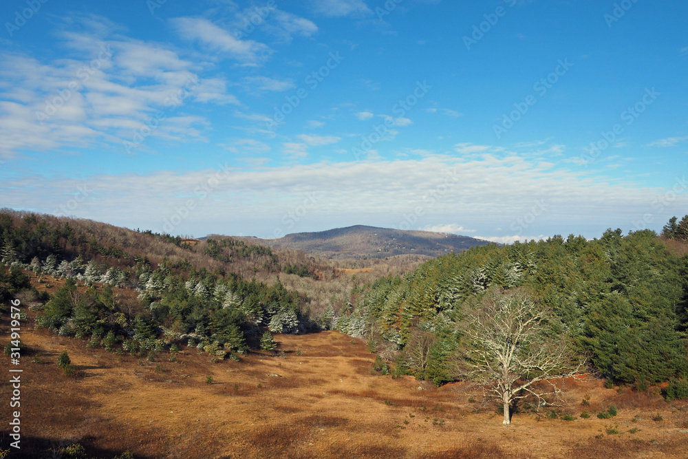 Winter landscape of mountains and forest on Blue Ridge Parkway near Blowing Rock, North Carolina.