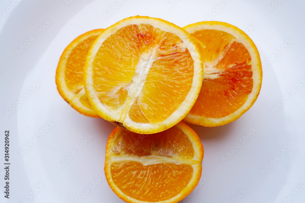 slices of orange isolated on white background slices of orange isolated on white background