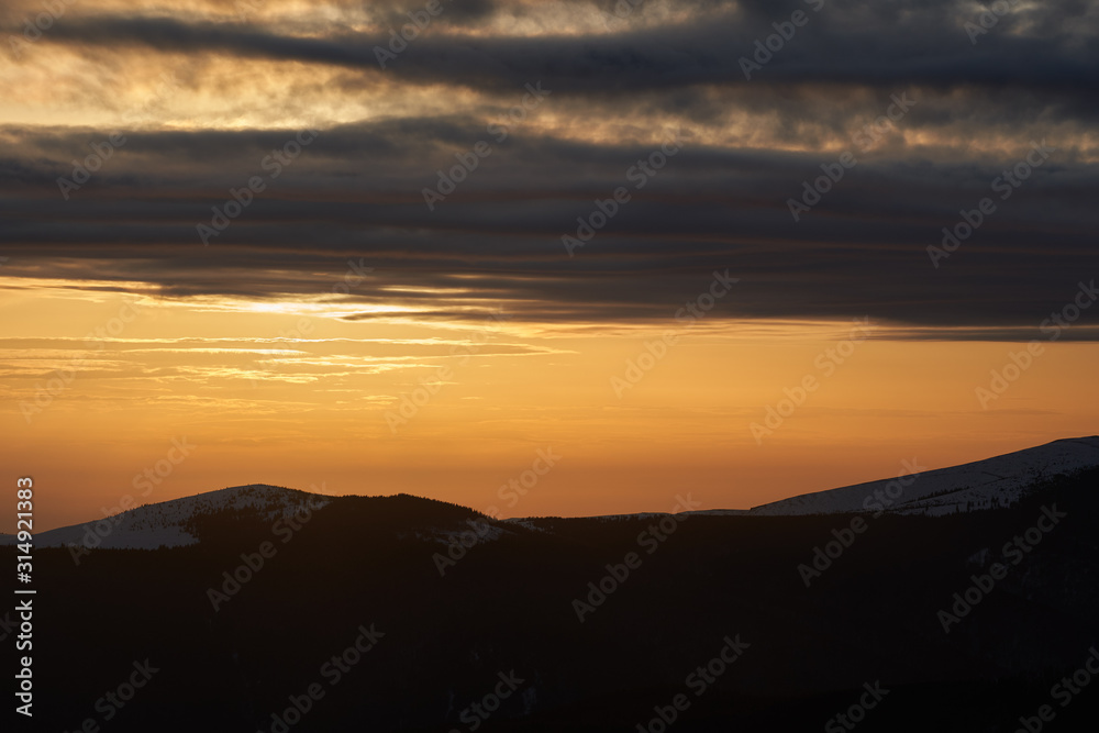 Mountain range in the evening, wintertime