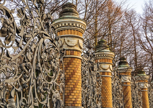 Photography Old openwork wrought iron fence of  Mikhailovsky Park in St