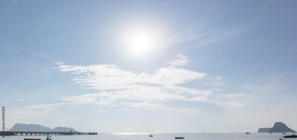 Panorama view of the long bridge. That long to sea And fishing boats park on sea.