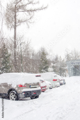 extreme snowfall with cars coverd with a lot of snow in Europe  Slovakia  mountain district