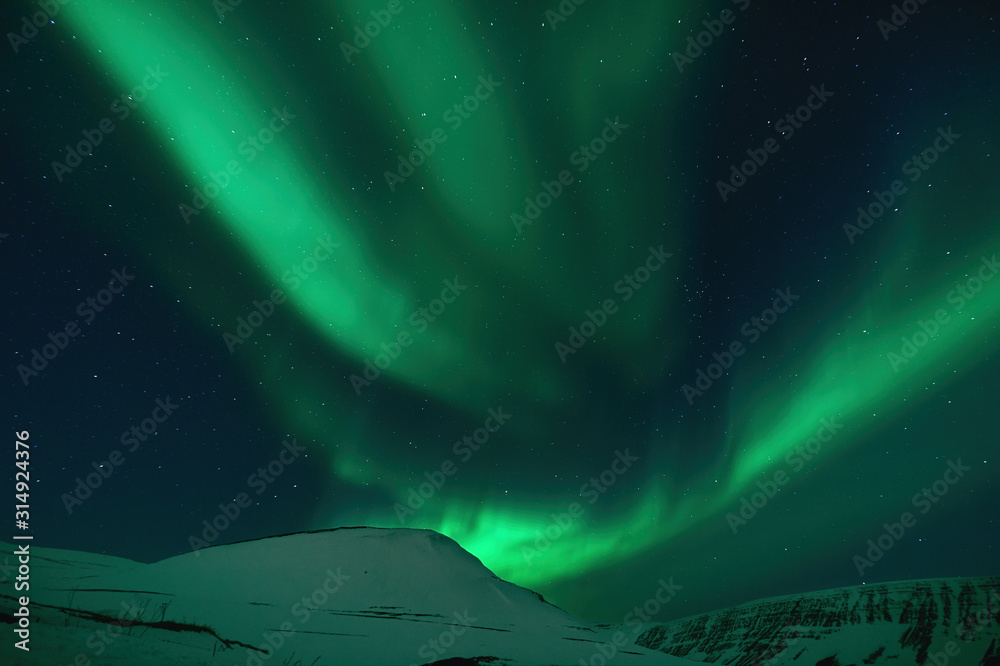 Wonderful northern lights in the Icelandic winter.