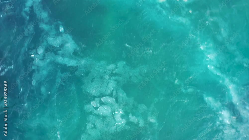 aerial view ice drift in a turquoise mountain river 