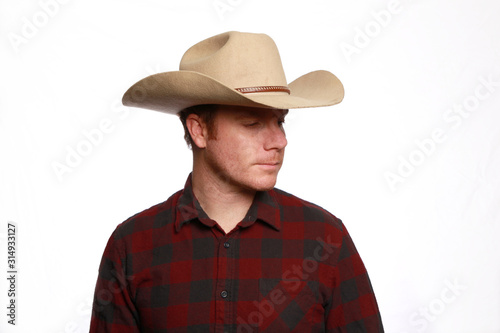 Cowboy in flannel shirt portrait 