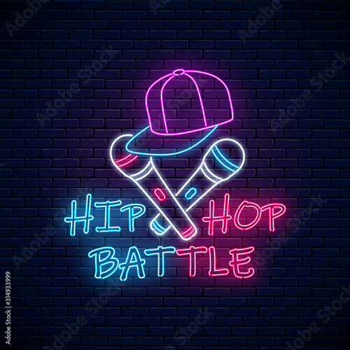 Hip hop battle neon sign with two microphones and baseball cap. Emblem of rap music. Dance contest advertisement design