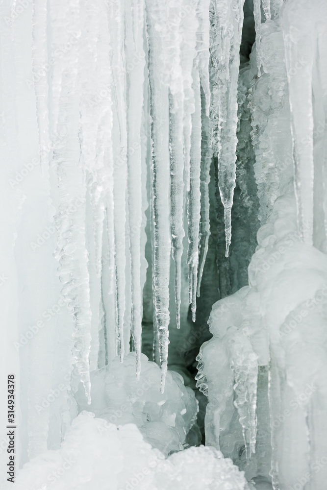 Seasonal winter nature detail, iciles, frozen water formations. Seasonal winter nature detail, iciles, frozen water formations.