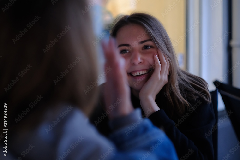 happy friends talking in summer cafe, outdoors happy friends talking in summer cafe, outdoors