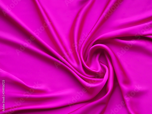 Pink smooth elegant luxurious satin background texture close up - abstracted wallpaper