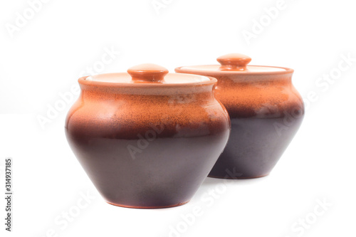 brown ceramic pots on white isolated background