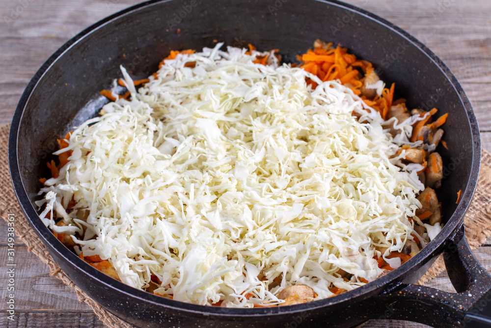 Stewed cabbage in a pan Stewed cabbage in a pan