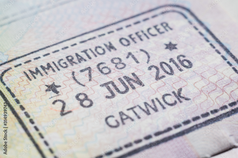 United Kingdom - January 2020: close up of immigration officer cutoms stamp in passport United Kingdom - January 2020: close up of immigration officer cutoms stamp in passport