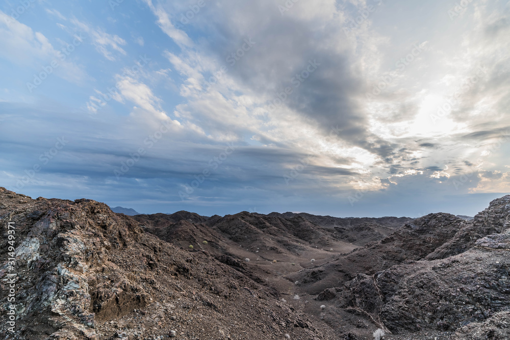 Scenic Sunset Sky and Cloudy Sky over Rocky Mountains Island