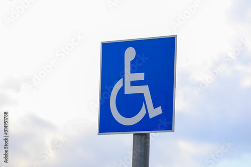Disabled parking signage. Accessibility parking. Handicapped parking. Wheelchair symbol.