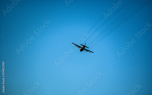 Fototapeta Naklejka Na Ścianę i Meble -  Marines Plane turning in flight