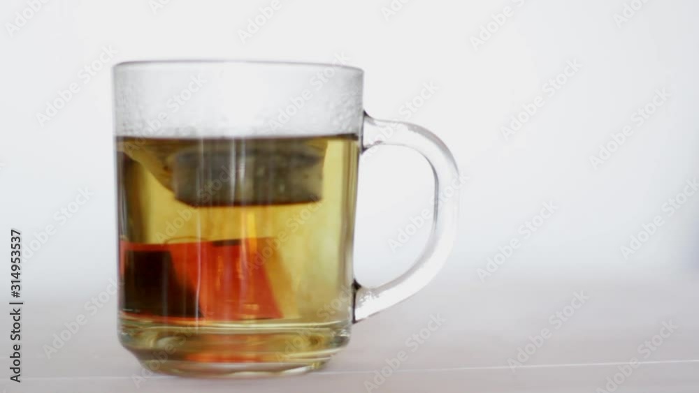 Time lapse of tea bag in hot water Time lapse of tea bag in hot water