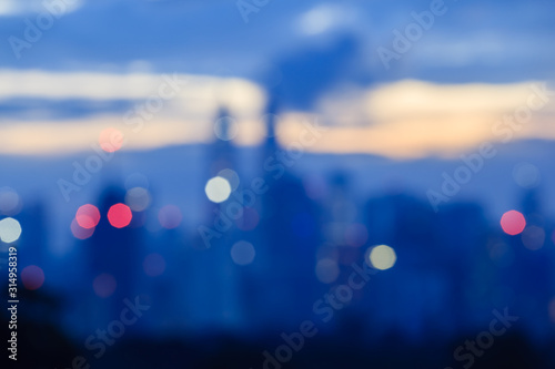 Canvas Print blurry image of kuala lumpur city skyline during sunrise