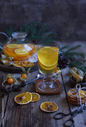 Winter tea with fresh orange . Cup of orange tea. Oriental tea. orange tea.