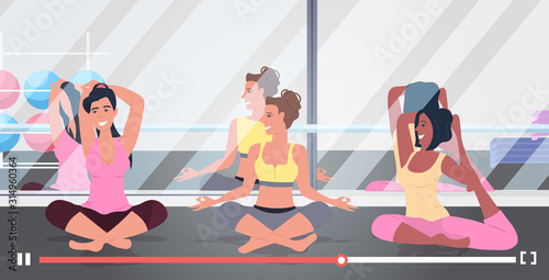 sportswomen bloggers doing fitness exercises mix race girls recording online video healthy lifestyle workout live streaming blogging concept gym studio interior full length horizontal vector
