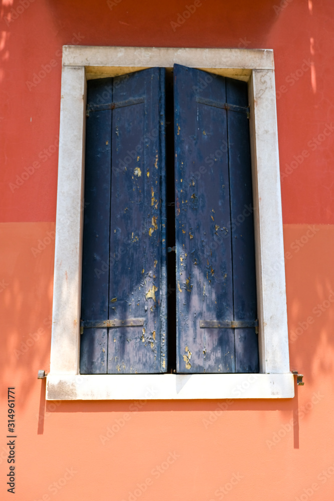 Old shutters in venetian house