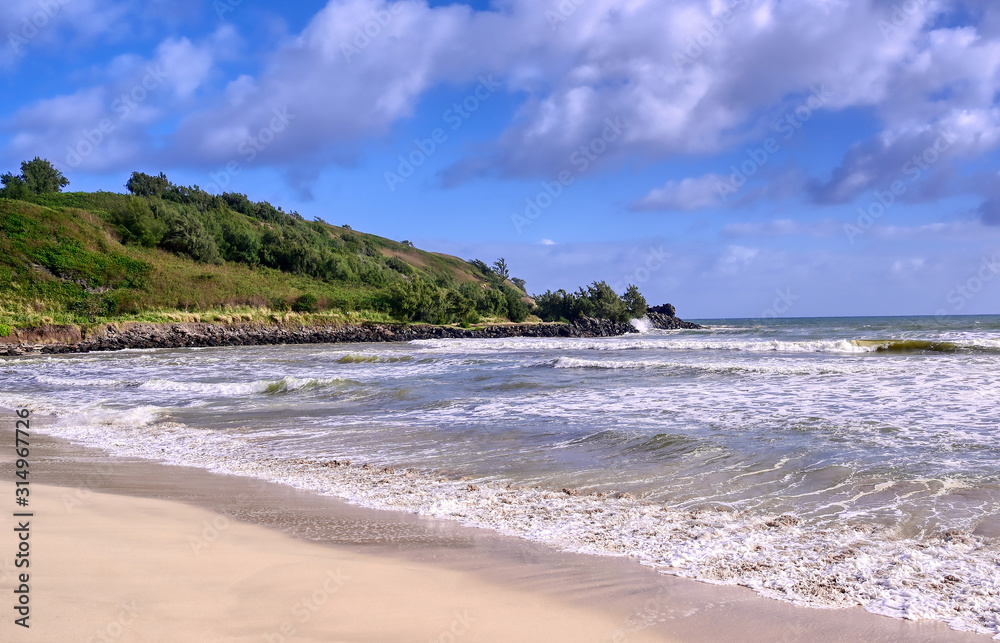 The beach along the coast of Kauai, Hawaii.