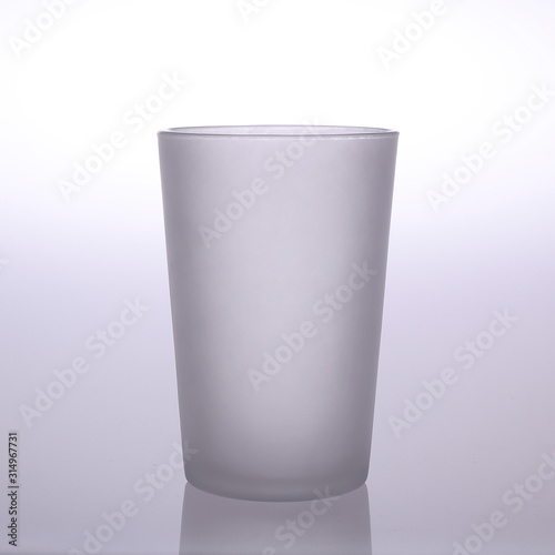 Empty doff glass isolated on white grey background