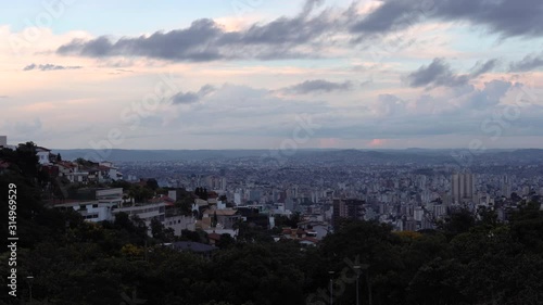 Wallpaper Mural Sunset time lapse of cityscape with high rise buildings and skyscrapers of Belo Horizonte, capital of the state Minas Gerais in Brazil seen from the hills surrounding the urban conglomerate Torontodigital.ca
