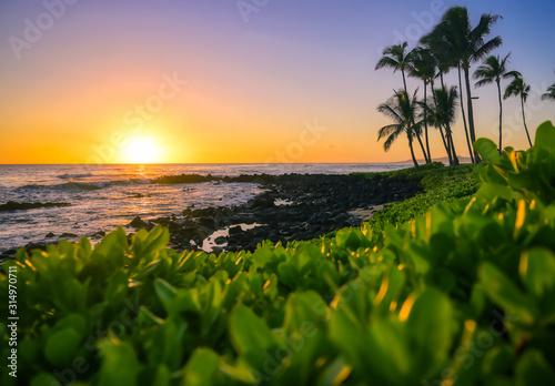 Sunset over the coast of Kauai, Hawaii. photo