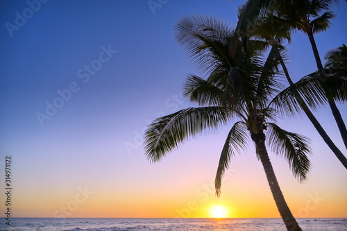 Sunset over the coast of Kauai, Hawaii.