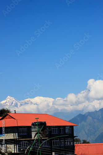 Snow-covered Mountain With Blue Sky, Cloud and Fog © SP Kiran