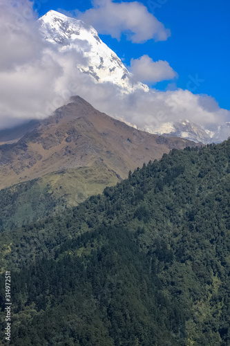 Snow-covered Mountain With Blue Sky  Cloud and Fog