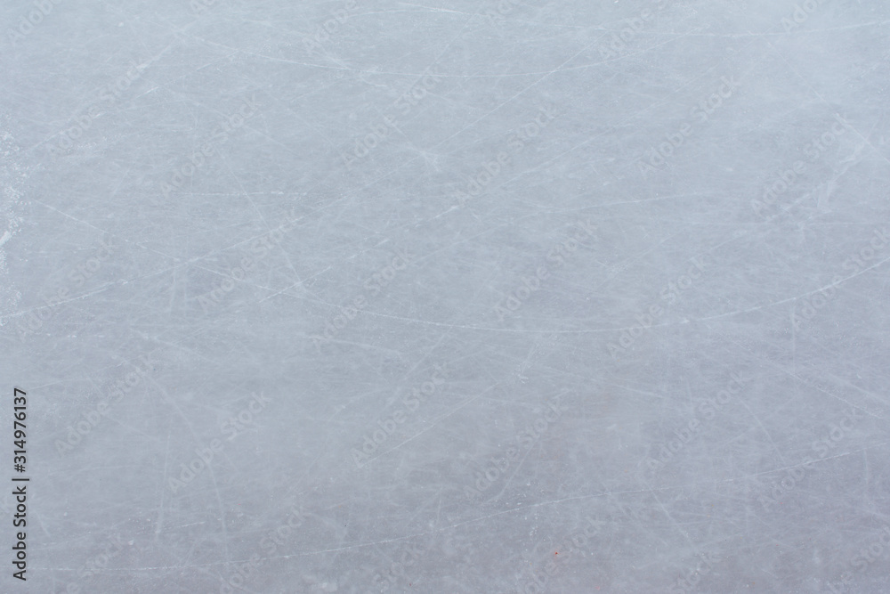 Naklejka premium Ice hockey rink scratches surface abstract background.