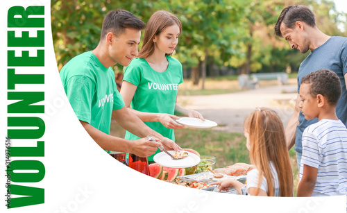 Young volunteers giving foo...