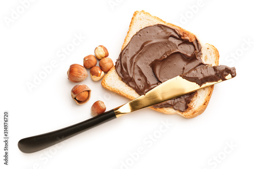 Bild auf Leinwand Fresh bread with chocolate paste on white background