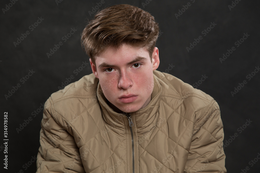 Portrait of serious young man in studio Portrait of serious young man in studio