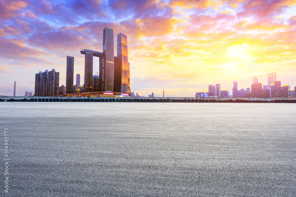 Empty race track and city skyline with buildings in Chongqing at sunset,China.