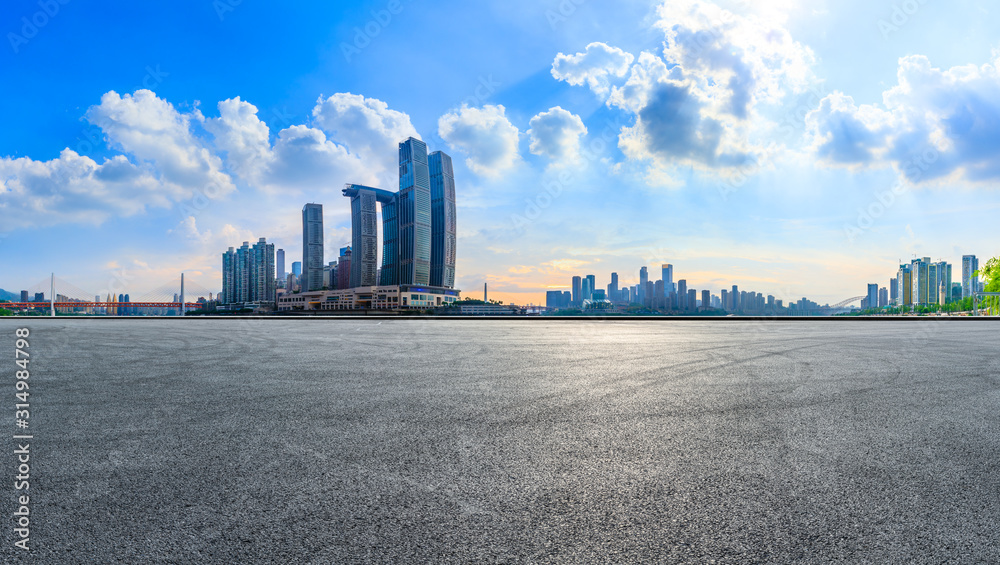 Empty race track and city skyline with buildings in Chongqing at sunset,China. Empty race track and city skyline with buildings in Chongqing at sunset,China.