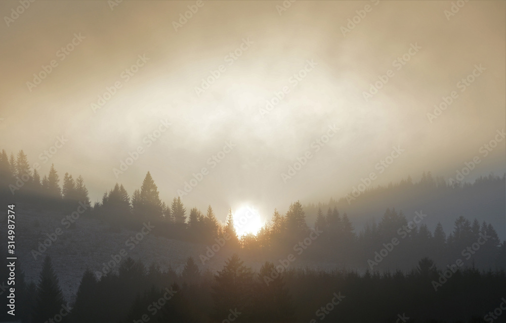 sunset after mountain with fog sunset after mountain with fog