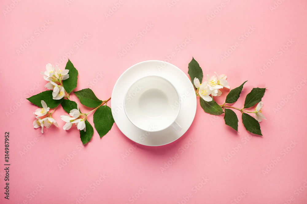 Tea and the blossoming jasmine Tea and the blossoming jasmine