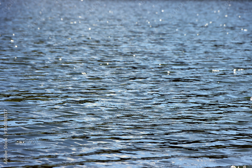 Gentle wave pattern with bright reflections stock photo