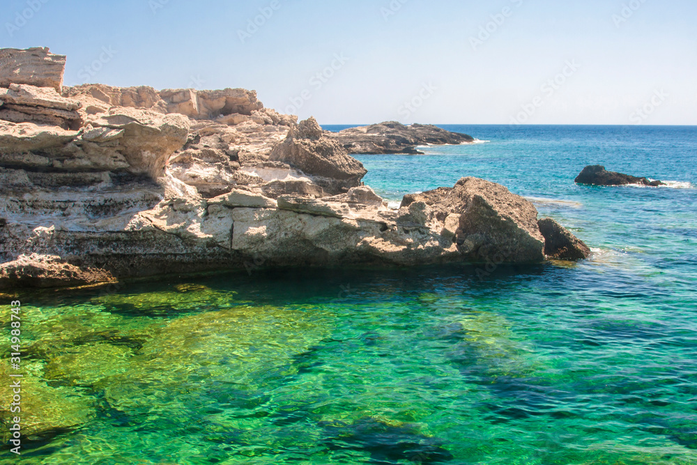 cliff in the crystal clear mediterranean sea