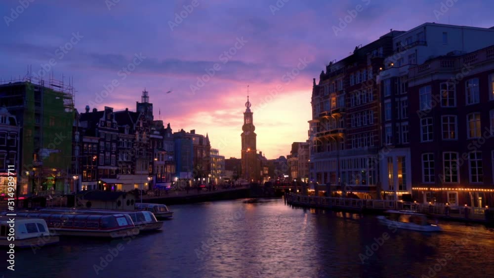 Timelapse of Amsterdam Cityscape, Coin Tower and Amstel River with Dramatic Clouds, Holland, Netherlands